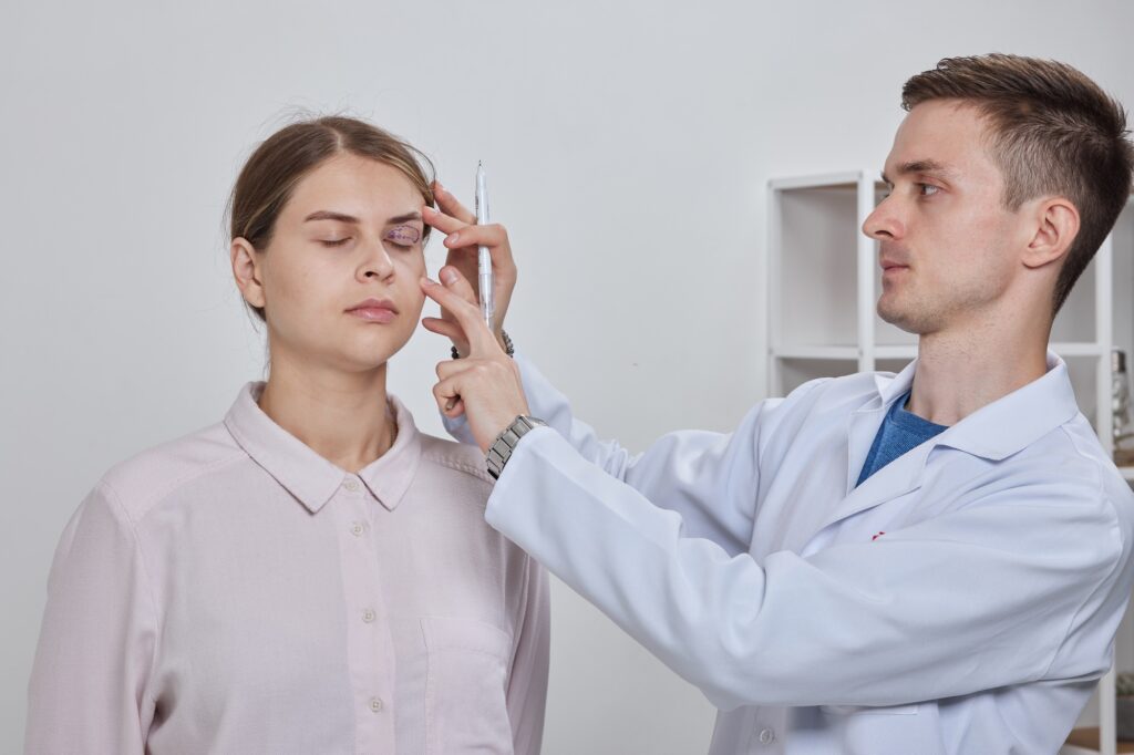 plastic surgeon prepares for Blepharoplasty, Blepharoplasty operation